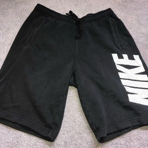 Two pairs of Nike sweatpants-shorts